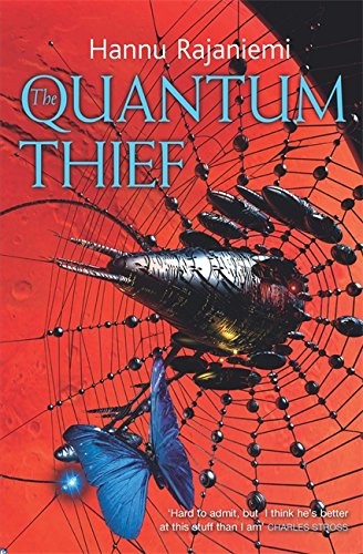 Cover of The Quantum Thief by Hannu Rajaniemi, Tor edition, showing a figure silhouetted against a glowing geometric cityscape